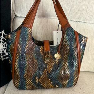 A brand NEW, never used Brahmin bag